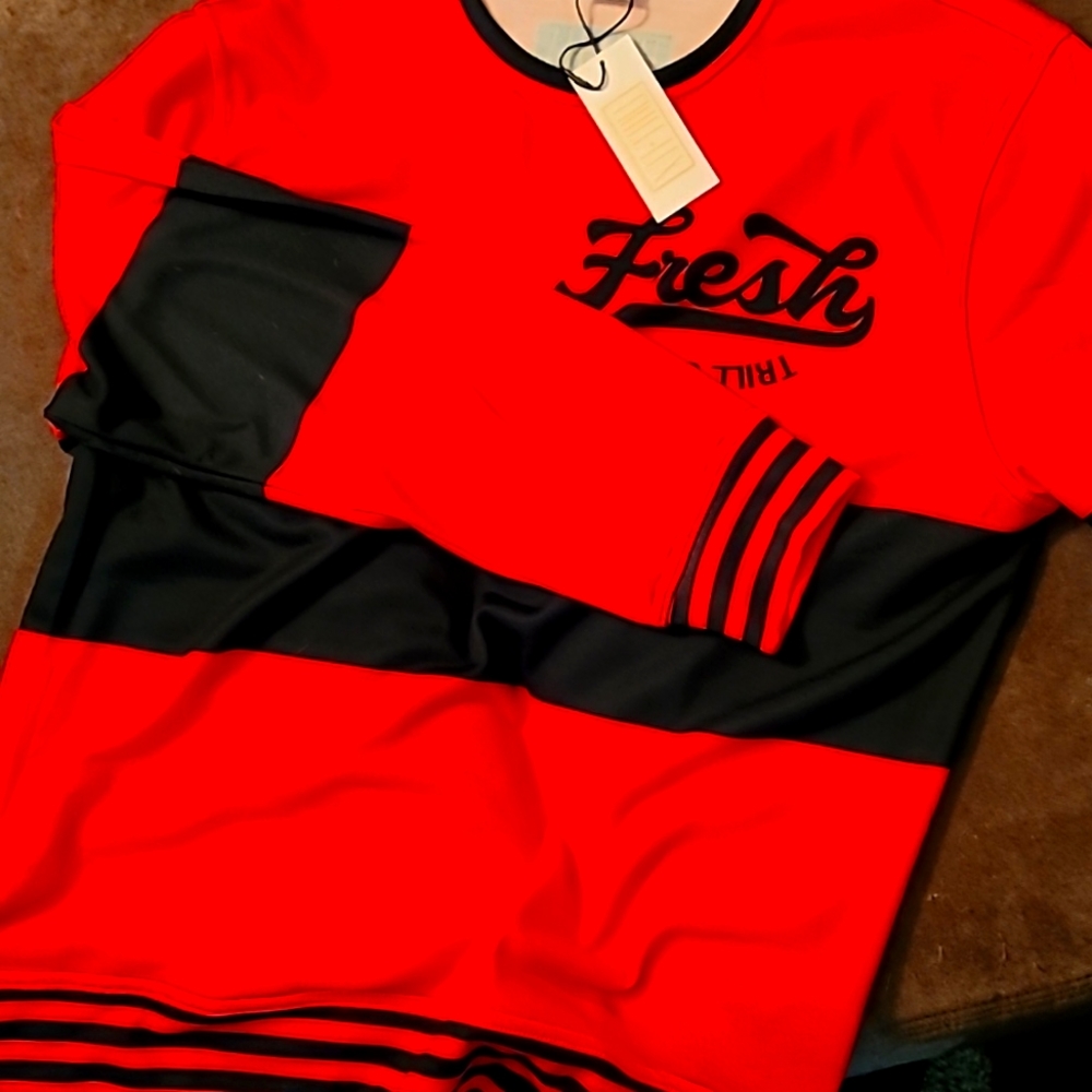 Brand New RED AND BLACK 2XL CREW NECK SWEAT SHIRT RUNS A LITTLE SMALL.